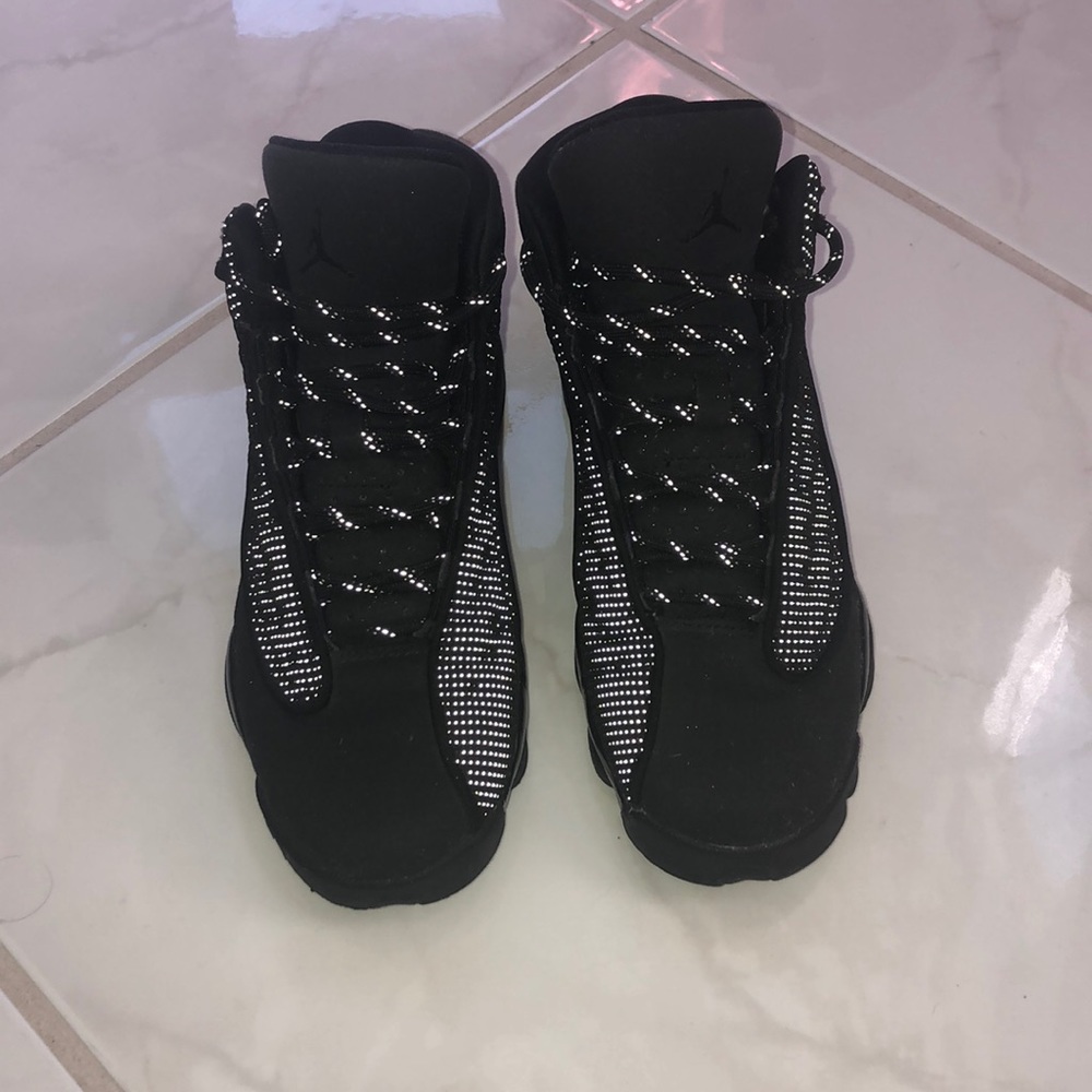 “Black Cat” Jordan 13’s with reflective dots